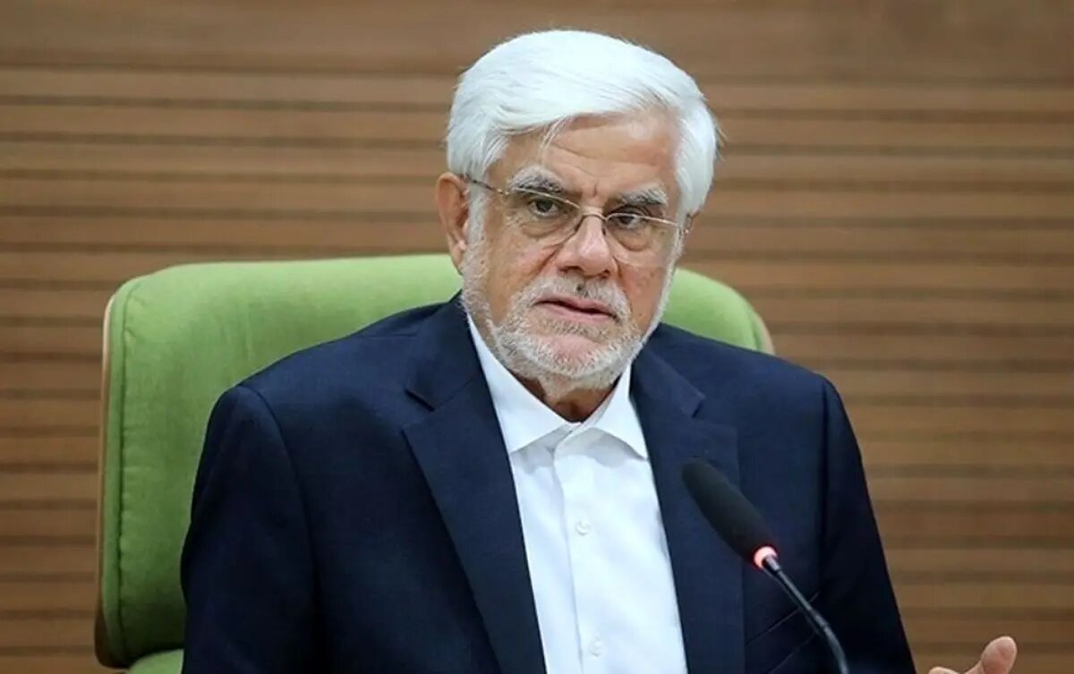 عکسی از عارف بر سر مزار شهید آل هاشم عکسی از عارف بر سر مزار شهید آل هاشم