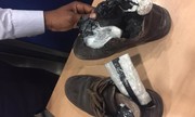 عکس | کشف مواد مخدر از کفش یک مسافر