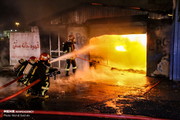 تصاویر | آتش‌سوزی کارگاه شارژ سیلندرهای گاز در قم