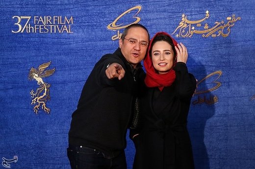 نگار جواهریان بازیگر و همسرش رامبد جوان تهیه‌کننده فیلم طلا در سی‌وهفتمین جشنواره فیلم فجر