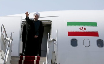 President Rouhani back home from Russia
