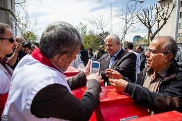 مراسم گلریزان جامعه ورزش برای کمک به مردم سیل‌زده