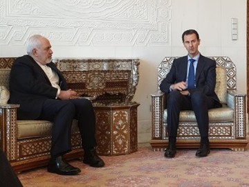  ظريف يبحث مع الرئيس الاسد القضايا ذات الاهتمام المشترك/صور