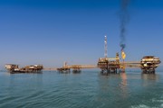 إيران وروسيا تبحثان توسيع التعاون في مجال النفط والغاز