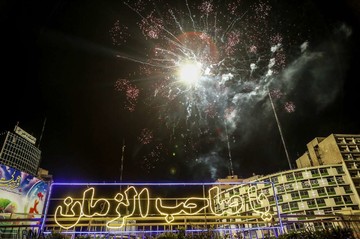 مراسم نورافشانی جشن نیمه شعبان در میادین شهر تهران