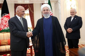 Iran, Afghan president confer bilateral ties