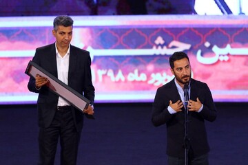 عادل فردوسی پور و نوید محمدزاده در بیست و یکمین جشن سینمای ایران