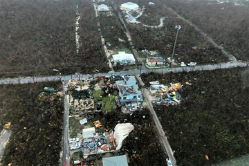تصاویر | «دوریان» سقف ساختمان‌ها را هم کند!