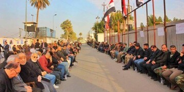 مراسم بزرگداشت شهدای حشد الشعبی در نزدیکی سفارت آمریکا / عکس