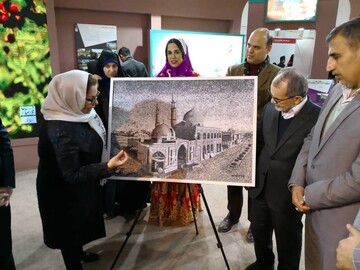 رونمایی از تابلو پارچه «مسجد جامع خرمشهر» در سیزدهمین نمایشگاه بین المللی گردشگری
