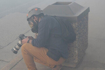 ببینید | سنگر گرفتن عکاس رویترز در مینیاپولیس آمریکا