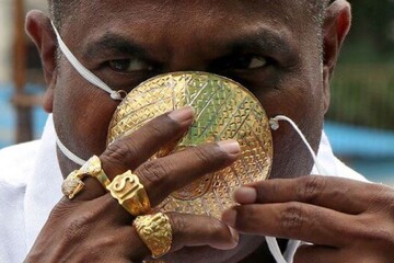 عکس | مقابله با ویروس کرونا با ماسک طلا!