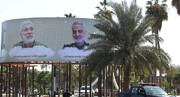 ادای احترام ظریف به شهیدان سلیمانی  و المهندس در بغداد / عکس