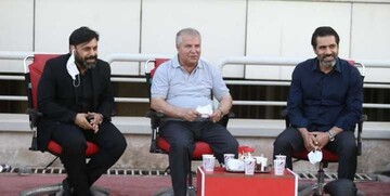 راهکار علی پروین برای فرار از سرما/عکس