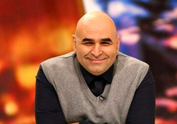 «علی مسعودی» درکنارپسرش/ عکس