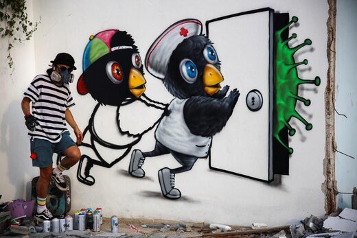 دیوار نویسی های خیابانی با الهام از کرونا