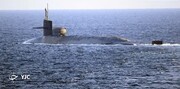 رصد زیردریایی مجهز به موشک و ناوگان جنگی آمریکا در خلیج فارس توسط سپاه پاسداران و ارتش ایران +عکس