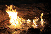 ببینید | رقص شعله های آتش در میان آب