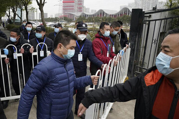 تصاویر | بازرسی خبرساز سازمان بهداشت جهانی از بیمارستانی در ووهان چین