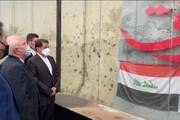 ببینید | ادای احترام ظریف به شهید سلیمانی در عراق