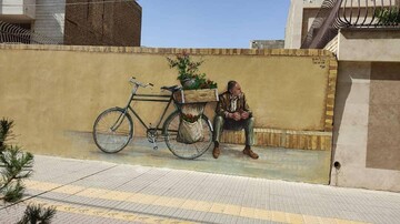 کار زیبای شهرداری برای پیرمردی که سال ها حوالی خیابان شریعتی اصفهان، با دوچرخه گل می فروشد