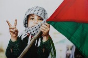 عکس | تصویری جالب از تقابل کودک فلسطینی با سرباز صهیونیست