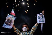 عکس | جشن پیروزی با تصویر حاج قاسم و رئیسی