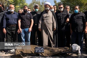 مراسم خاکسپاری فتحعلی اویسی