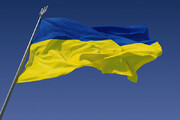 عکس | نصب پرچم اوکراین در یک مراسم مذهبی