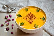 ببینید | طرز تهیه خاطره‌انگیزترین دسر ماه رمضان؛ پخت شله زرد در خانه