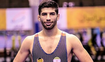 قهرمان آسیا آرایشگر شد!/عکس
