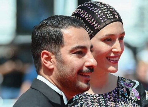 واکنش نوید محمدزاده به بوسیدن فرشته حسینی روی فرش قرمز جشنواره کن / زنم است