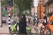 ببینید | موتورسواری خانم چادری در خیابان‌های آمستردام هلند