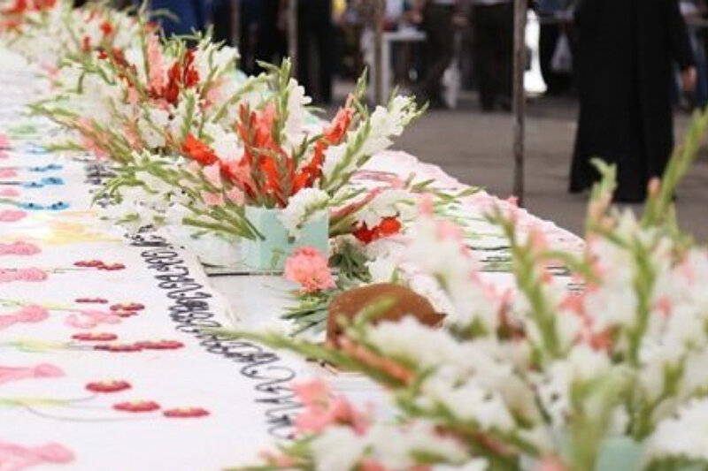 ببینید | پخت بزرگترین کیک جهان به طول 1400 متر در حرم امام علی (ع) توسط قنادان ایرانی