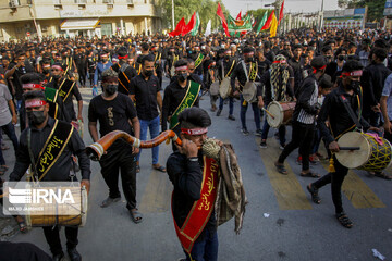 تصاویر | مراسم سنتی علم گردانی در میناب