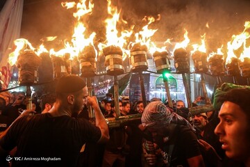 گزارش تصویری از آئین سنتی «مشعل گردانی» عراقی های مقیم تهران 