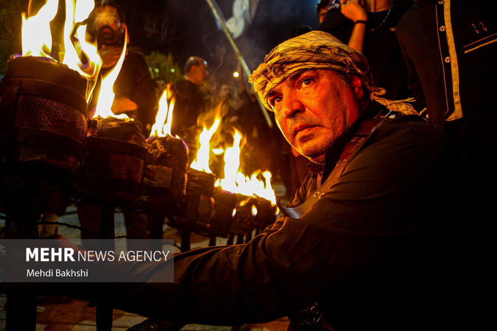 آیین مشعل گردانی نجفی‌های مقیم قم