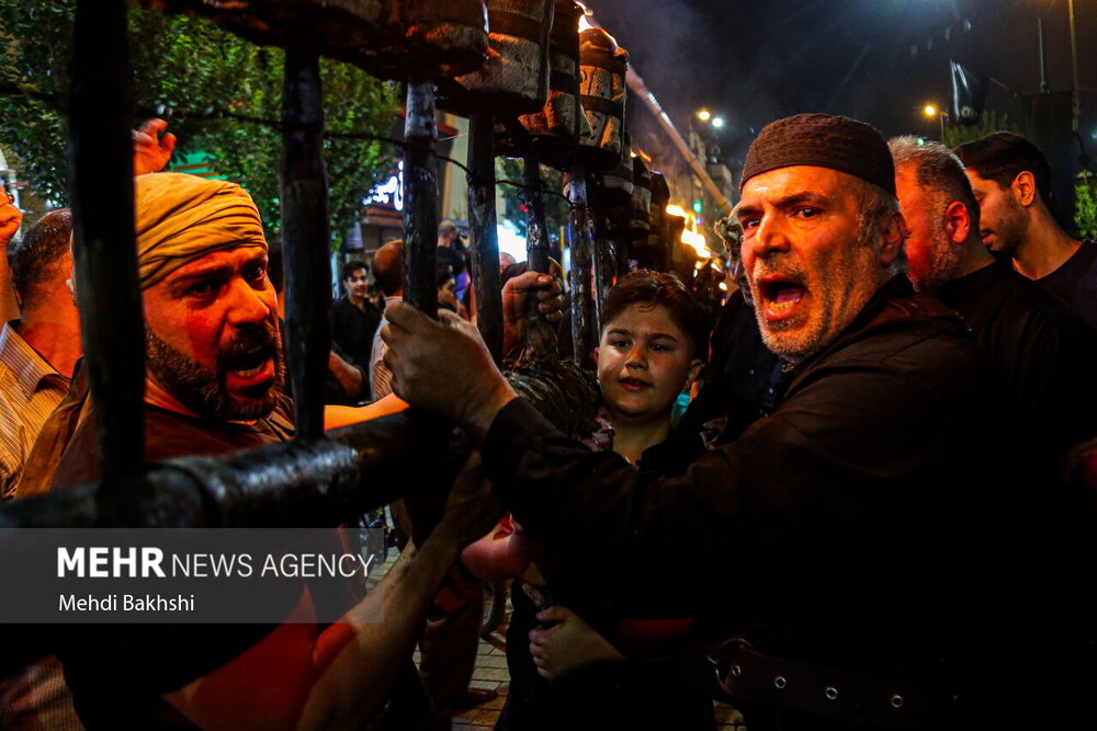 آیین مشعل گردانی نجفی‌های مقیم قم