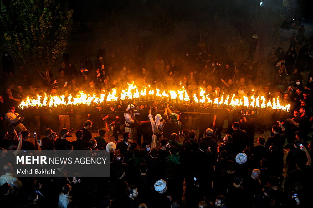 آیین مشعل گردانی نجفی‌های مقیم قم