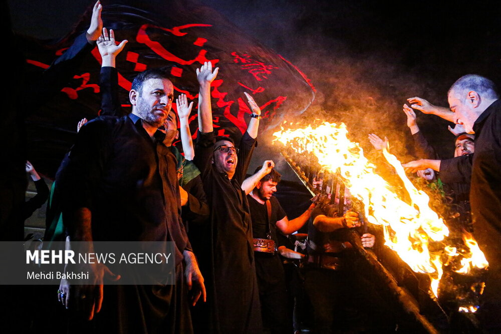 آیین مشعل گردانی نجفی‌های مقیم قم