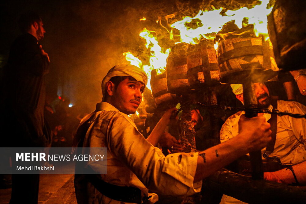 آیین مشعل گردانی نجفی‌های مقیم قم