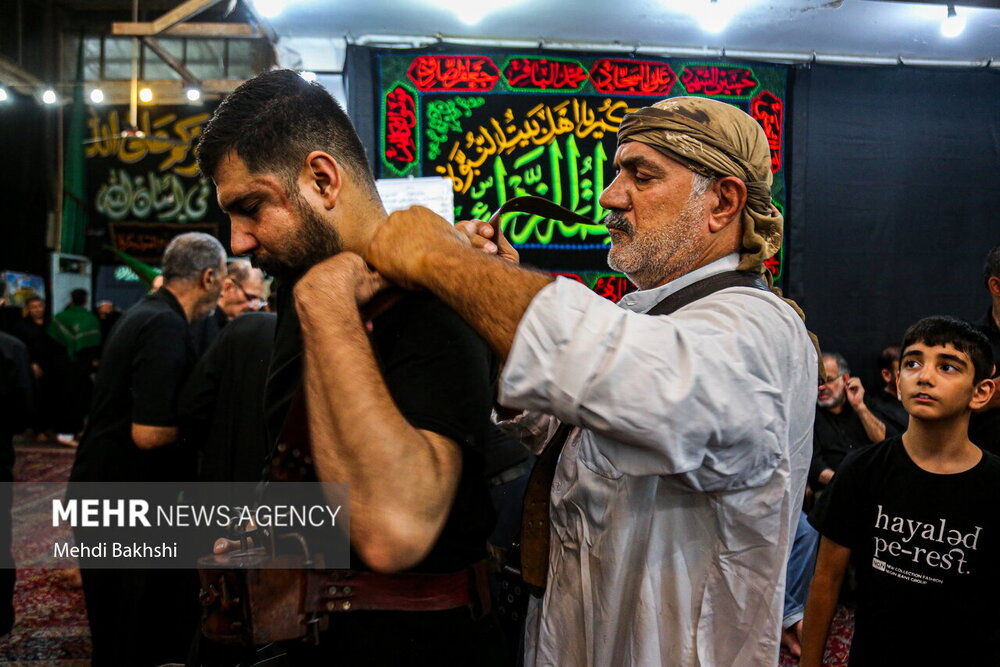 آیین مشعل گردانی نجفی‌های مقیم قم