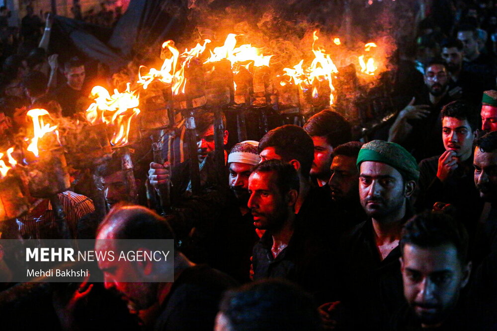 آیین مشعل گردانی نجفی‌های مقیم قم