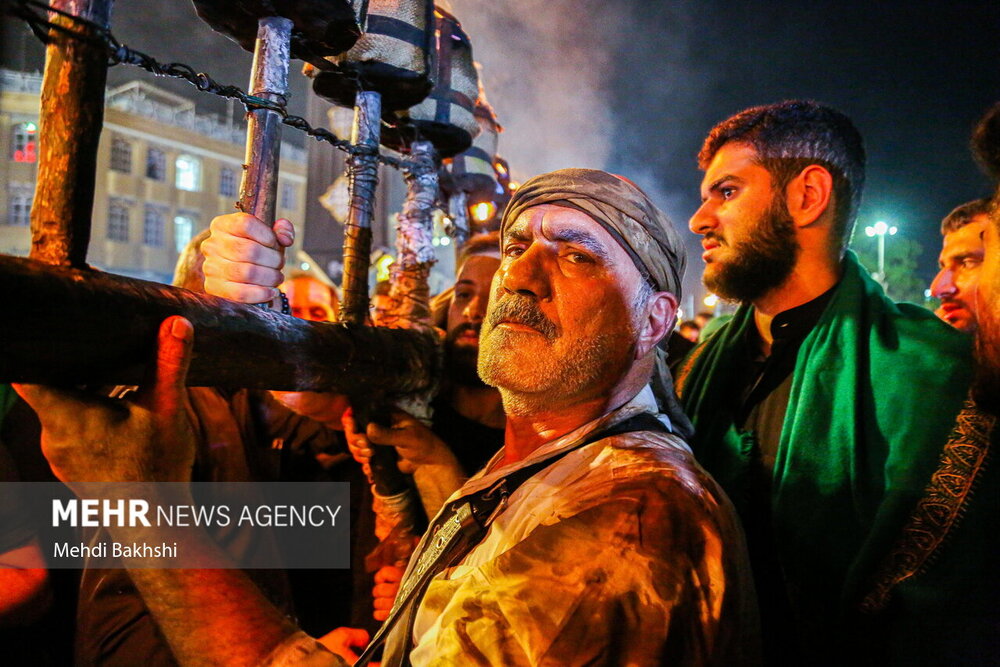 آیین مشعل گردانی نجفی‌های مقیم قم