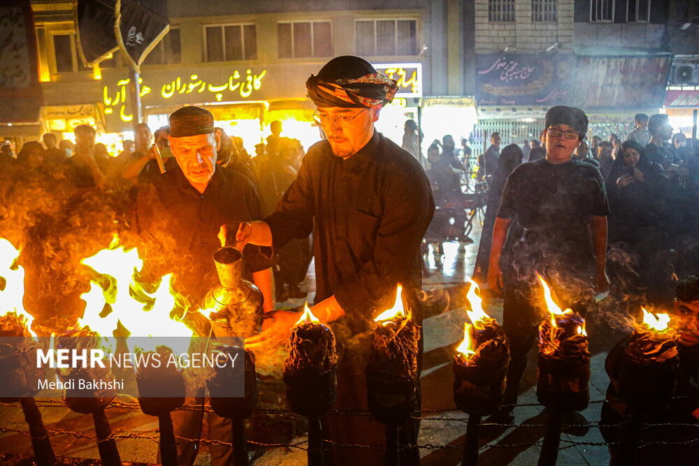 آیین مشعل گردانی نجفی‌های مقیم قم