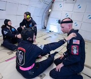 عکس | ۱۴ فضانورد دارای معلولیت در شرایط بی‌وزنی قرار گرفتند