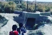 ببینید | پرتاب تریاک از مرز افغانستان به داخل خاک ایران با منجنیق
