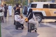 ببینید | چمدان‌ سواری دو زن در خیابان‌های دبی!