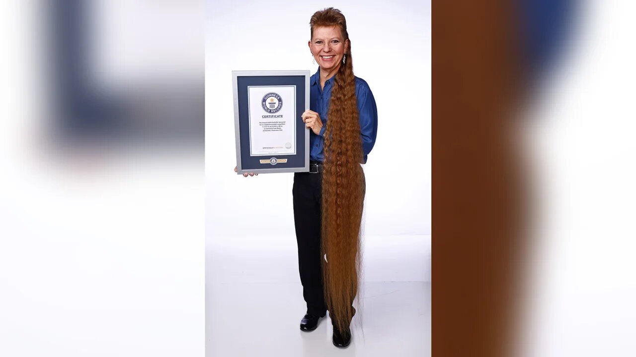 زنی که ۳۳ سال موهای خود را کوتاه نکرد، رکورد گینس را زد/ عکس