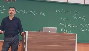 تصویری از استاد اخراجی شریف در میان طراحان سوال المپیاد جهانی